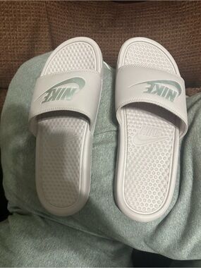 NIKE slides, gently used.